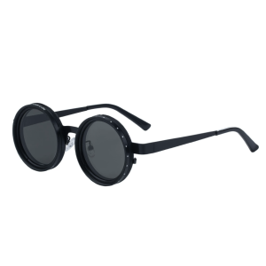 Matte black round sunglasses with decorative studded frames and dark lenses.