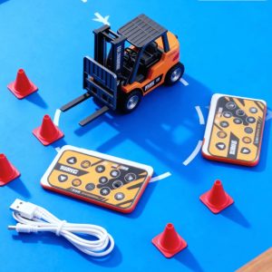 Remote control toy forklift set with two controllers, traffic cones, and USB cable on a blue play mat.